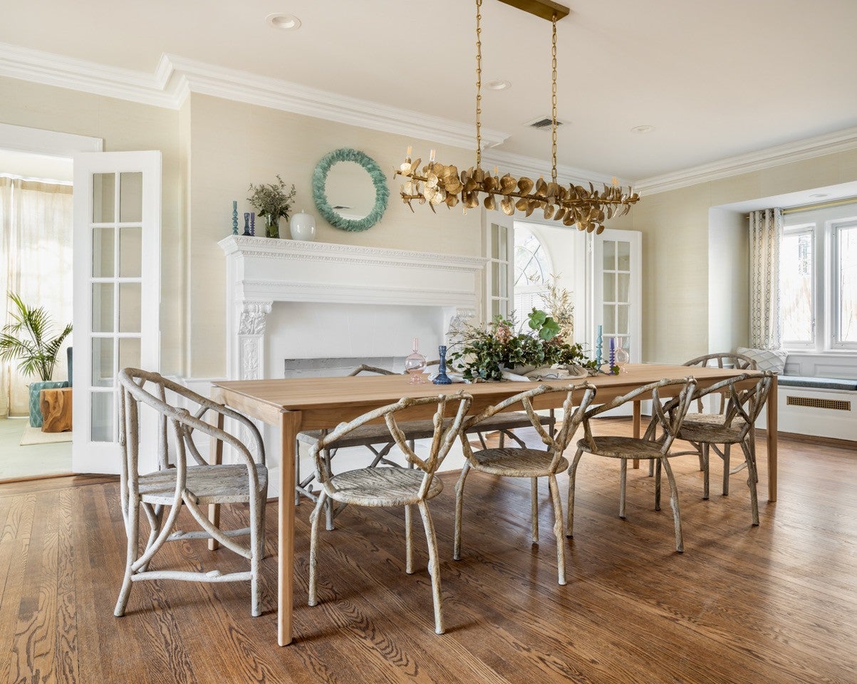 Luxury apartment interior renovation in NYC featuring custom woodwork, modern lighting, and open concept living space by Gotham Luxury Group.